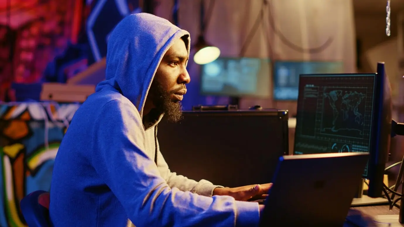 A hacker using a VPN to hide their online identity.